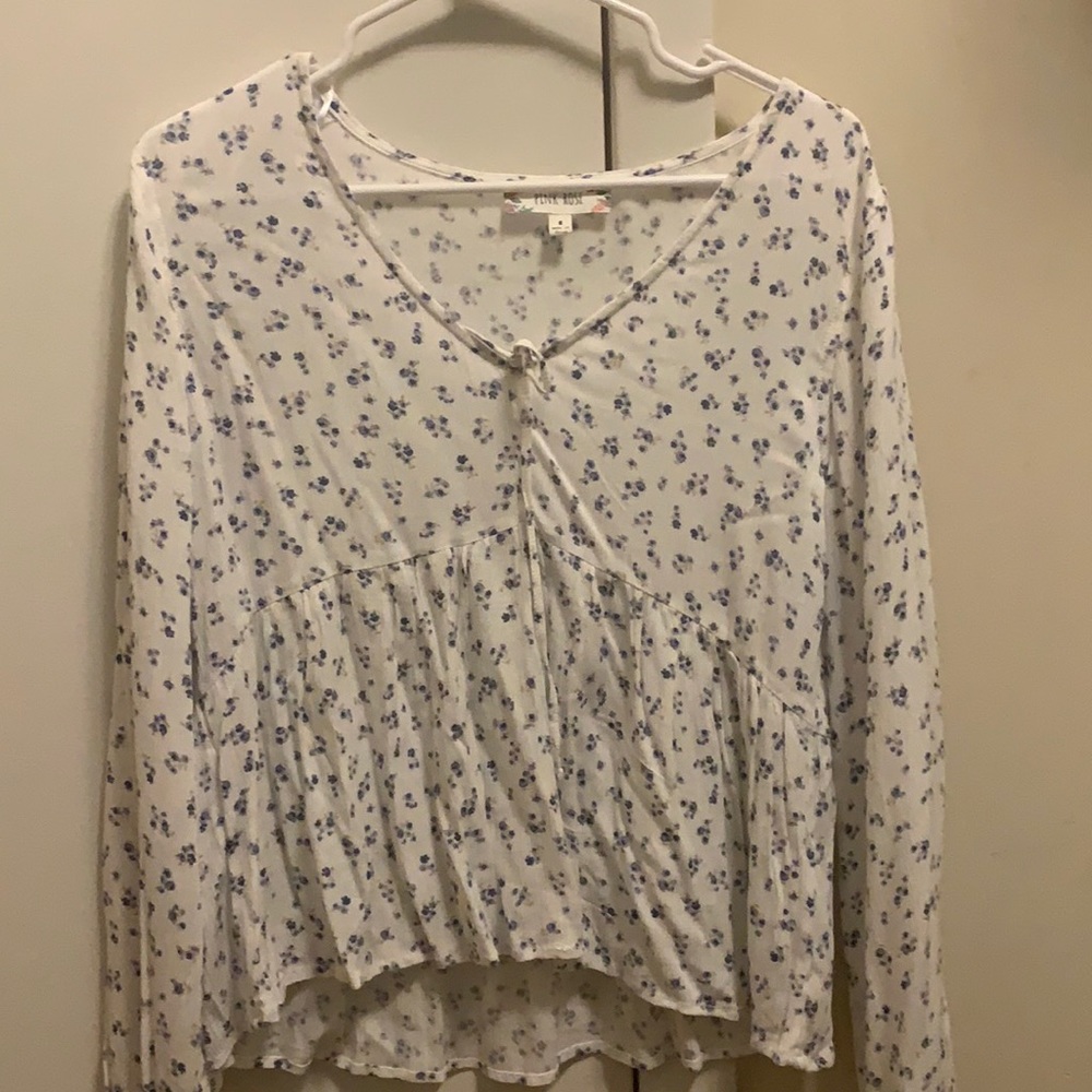 White floral top.